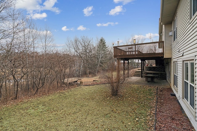 view of yard with a patio and a deck