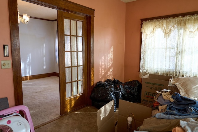 misc room with ornamental molding, carpet flooring, and baseboards