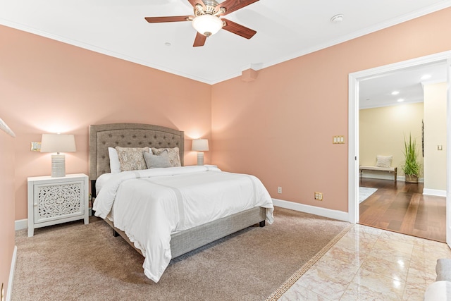 bedroom featuring ceiling fan and ornamental molding