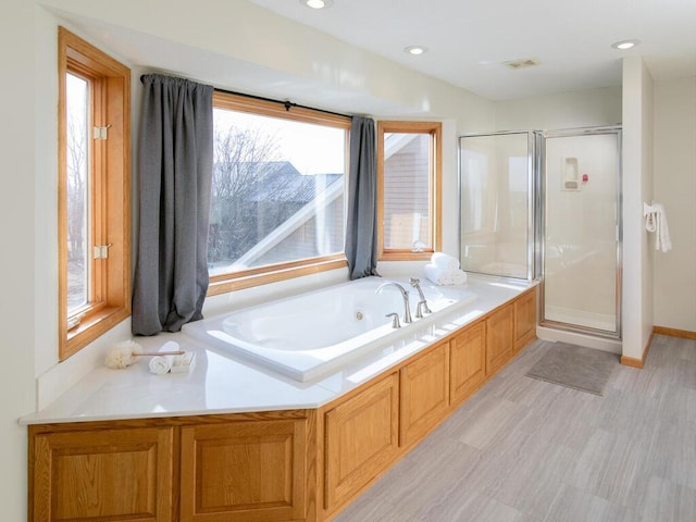 bathroom with plus walk in shower