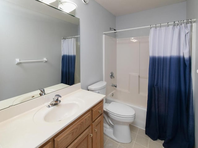 full bathroom with tile patterned flooring, vanity, toilet, and shower / bath combo