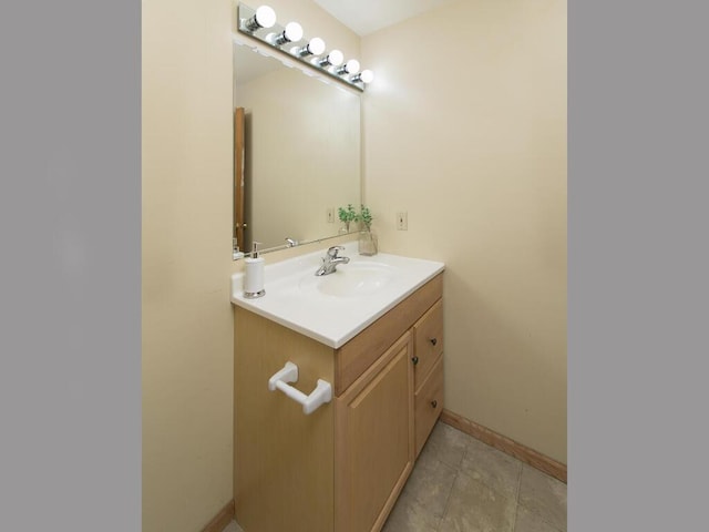 bathroom with vanity and tile patterned flooring