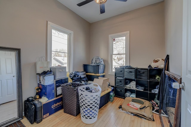 storage area featuring ceiling fan