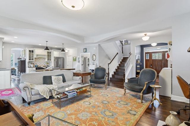 living room with dark hardwood / wood-style floors