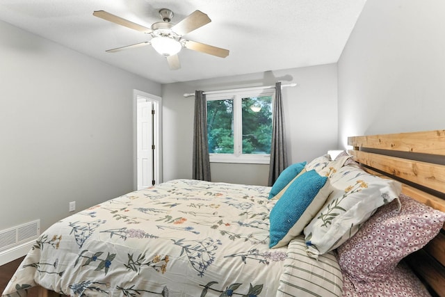 8385 Pleasant View Dr, Mounds View, MN 55112 - bedroom with wood finished floors and ceiling fan