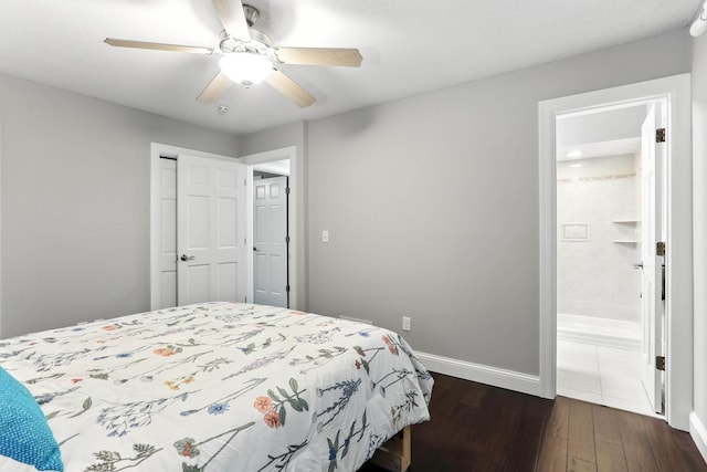8385 Pleasant View Dr, Mounds View, MN 55112 - bedroom featuring dark wood-type flooring, ensuite bath, a closet, and ceiling fan