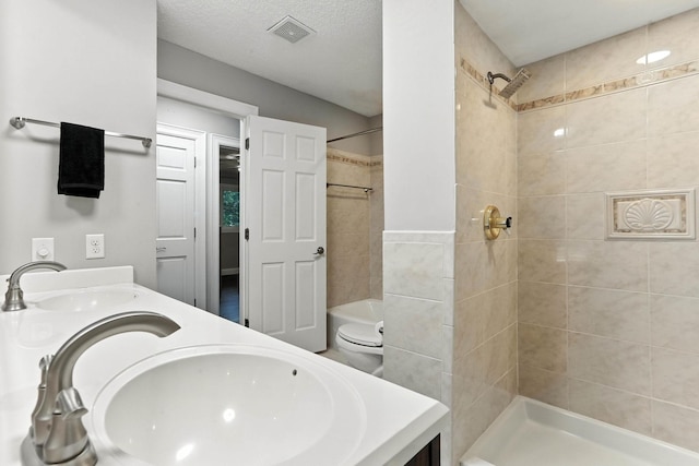 8385 Pleasant View Dr, Mounds View, MN 55112 - bathroom with double vanity and toilet