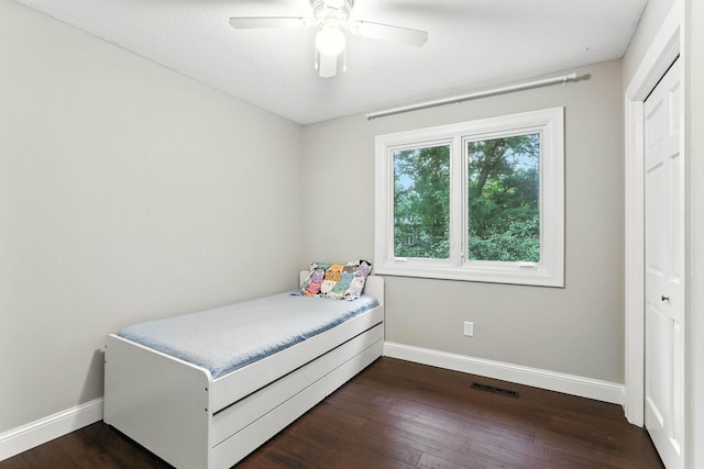 8385 Pleasant View Dr, Mounds View, MN 55112 - bedroom with dark wood-style flooring and a ceiling fan