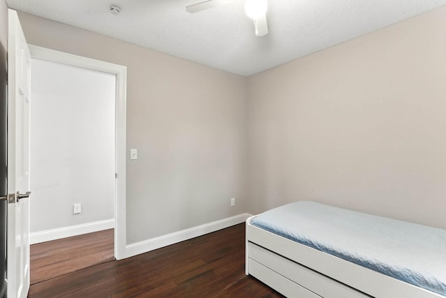 8385 Pleasant View Dr, Mounds View, MN 55112 - bedroom featuring dark wood-style floors and a ceiling fan