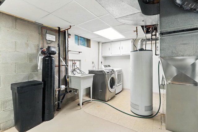 8385 Pleasant View Dr, Mounds View, MN 55112 - laundry area with water heater, separate washer and dryer, concrete block wall, and cabinet space