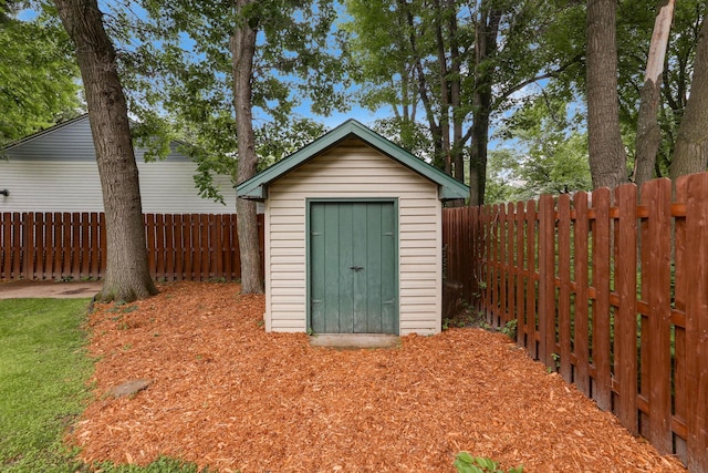 8385 Pleasant View Dr, Mounds View, MN 55112 - view of shed with a fenced backyard