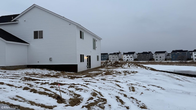 view of snow covered property