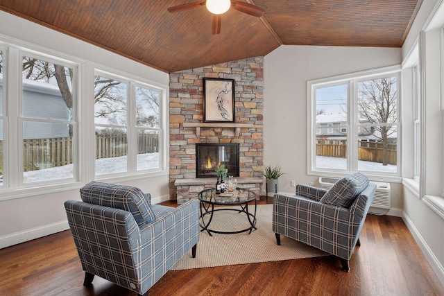 living room featuring lofted ceiling, ceiling fan, a fireplace, dark hardwood / wood-style flooring, and wood ceiling