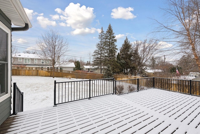 view of snow covered deck