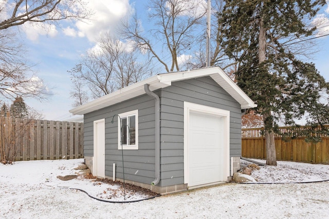 view of snow covered garage