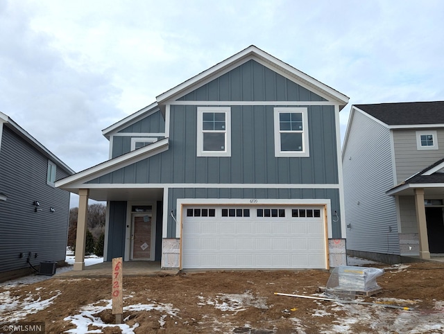 view of front of property with a garage