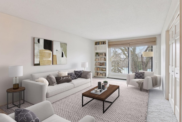 carpeted living room with a textured ceiling