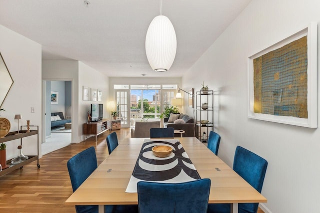 dining area featuring hardwood / wood-style floors