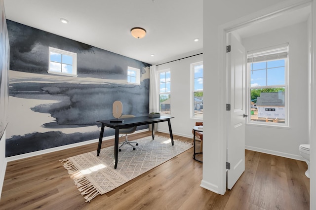 office with hardwood / wood-style flooring