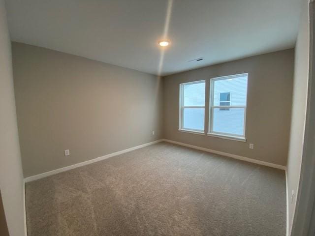 view of carpeted spare room