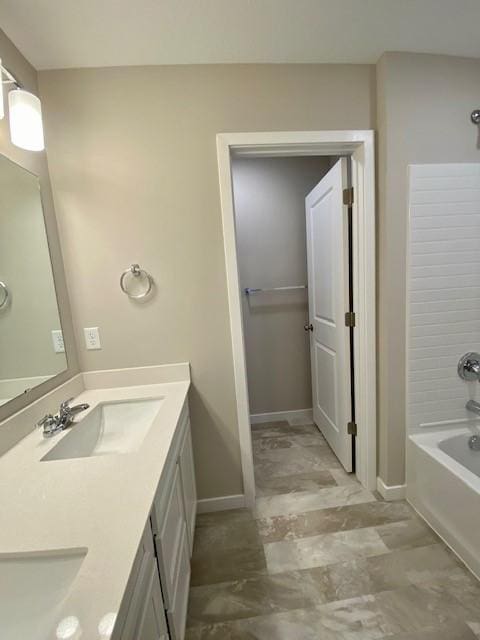 bathroom with vanity and shower / bath combination