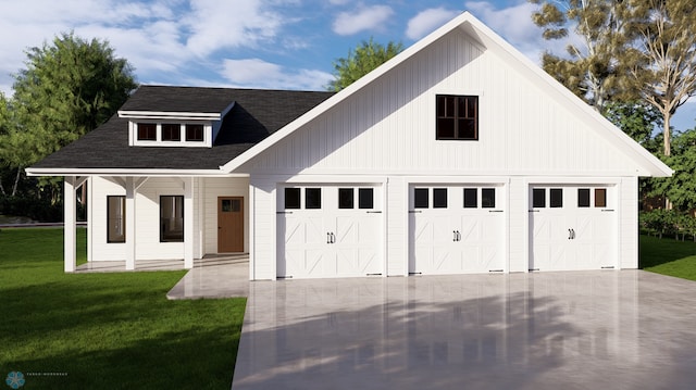 view of front facade featuring a garage, a front lawn, and covered porch