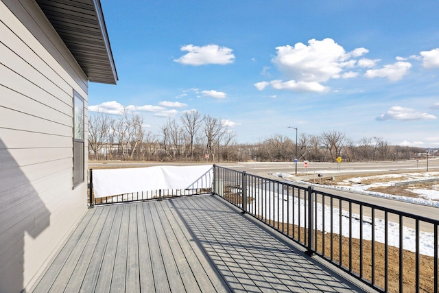 view of snow covered deck