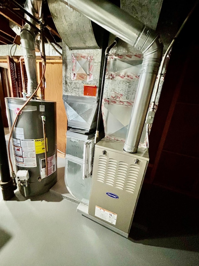 utility room with water heater