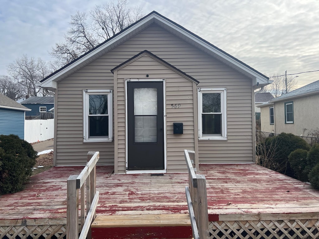 view of front of property featuring a wooden deck