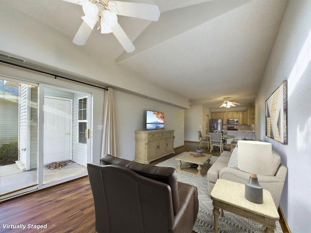 living room with dark hardwood / wood-style flooring and ceiling fan