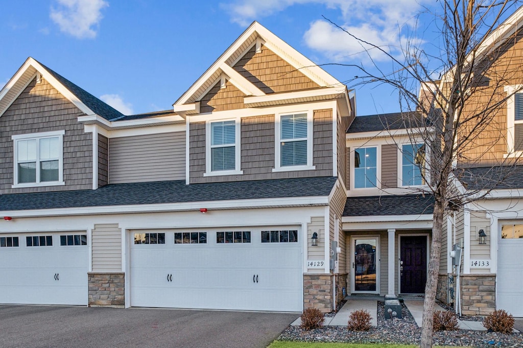 craftsman-style home featuring a garage