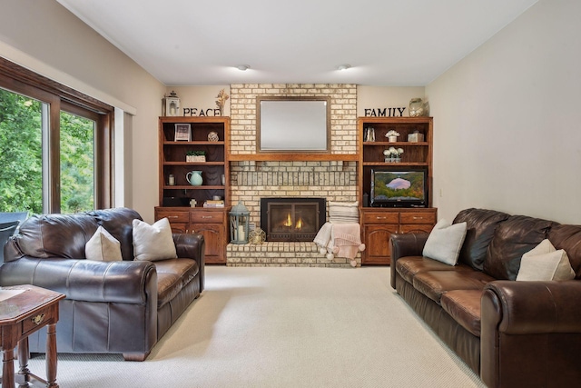 carpeted living room with a fireplace