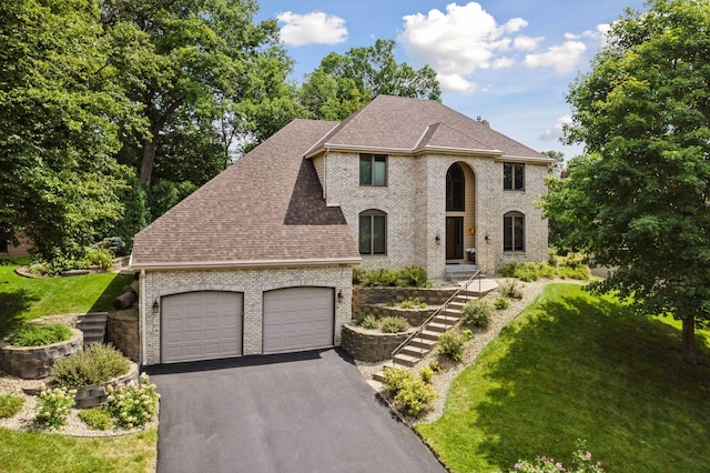 view of front of home with a front lawn