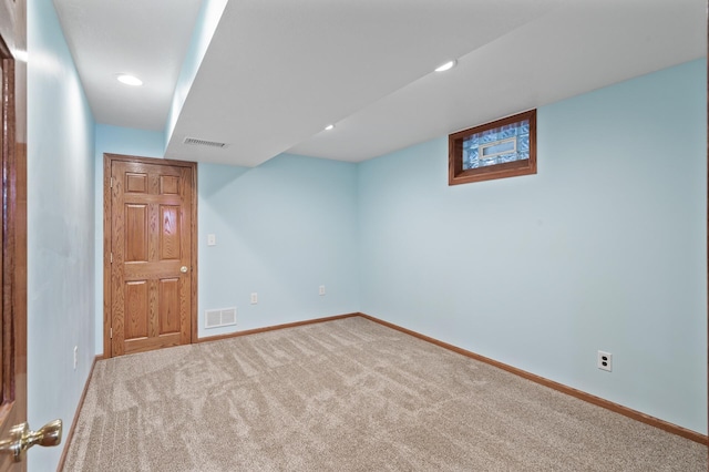 basement featuring carpet flooring