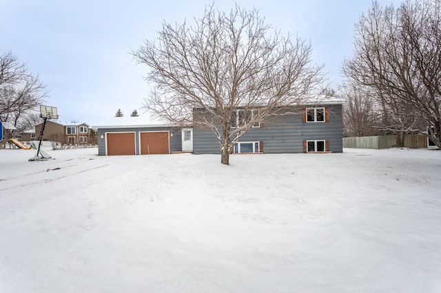 view of snow covered house