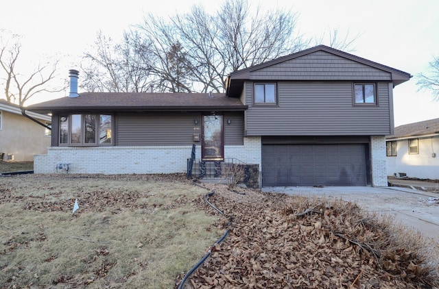 split level home with a garage