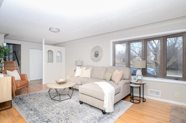 living room with hardwood / wood-style flooring