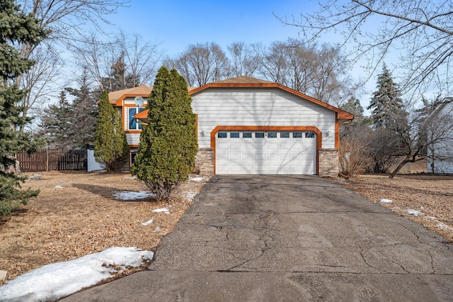 view of front of property with a garage