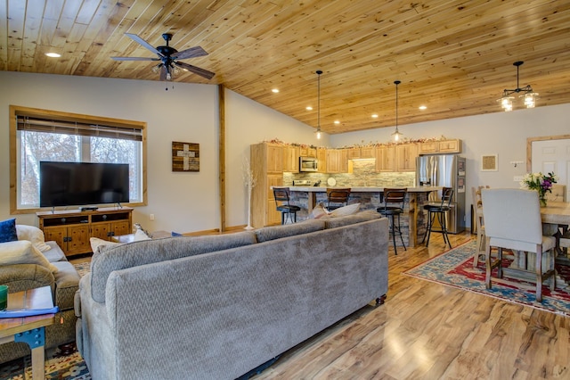 living room featuring ceiling fan, high vaulted ceiling, wooden ceiling, and light wood-type flooring