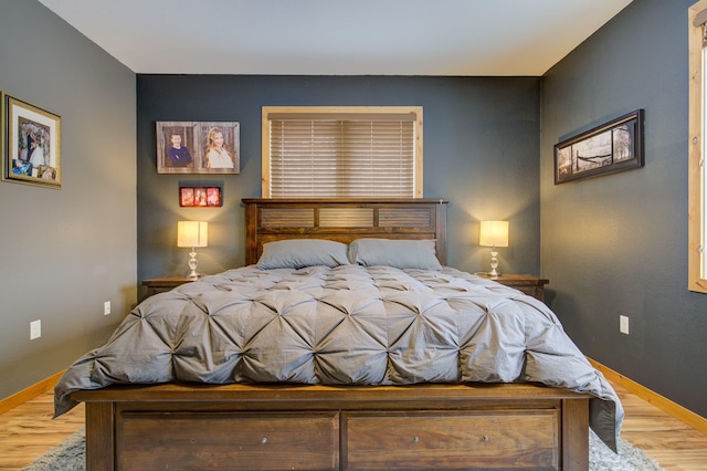 bedroom featuring hardwood / wood-style floors