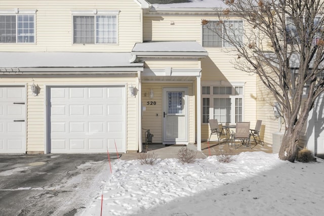 exterior space with a garage