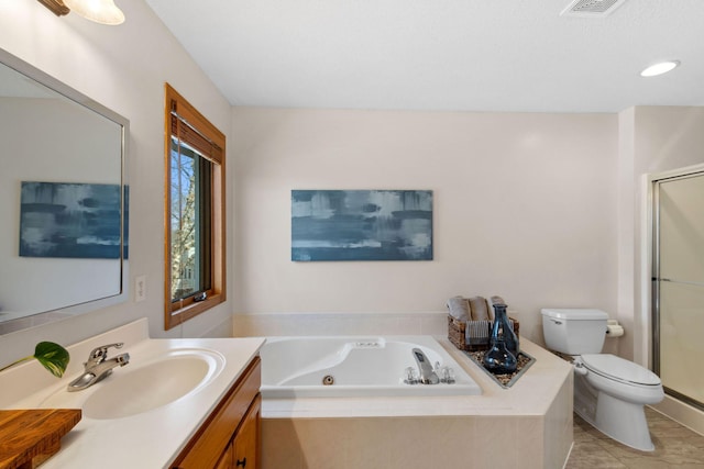 bathroom featuring a tub with jets, a stall shower, toilet, and vanity