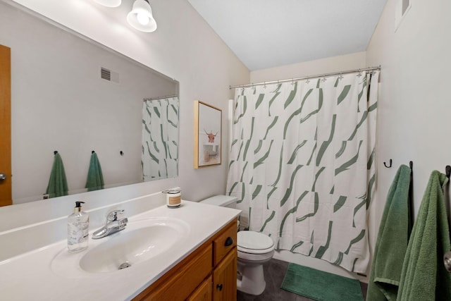 bathroom with a shower with shower curtain, visible vents, toilet, and vanity