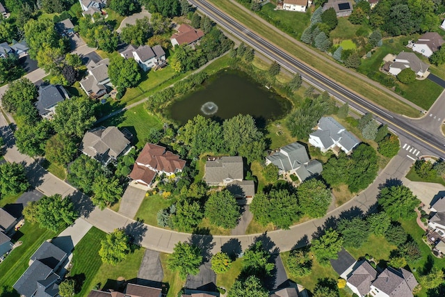 birds eye view of property with a residential view