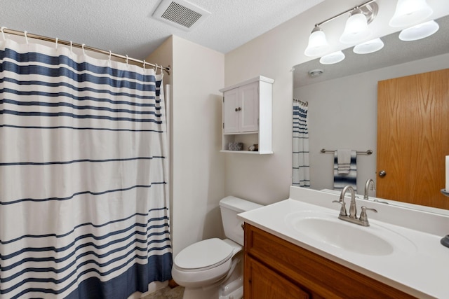 full bathroom with visible vents, toilet, vanity, a shower with curtain, and a textured ceiling