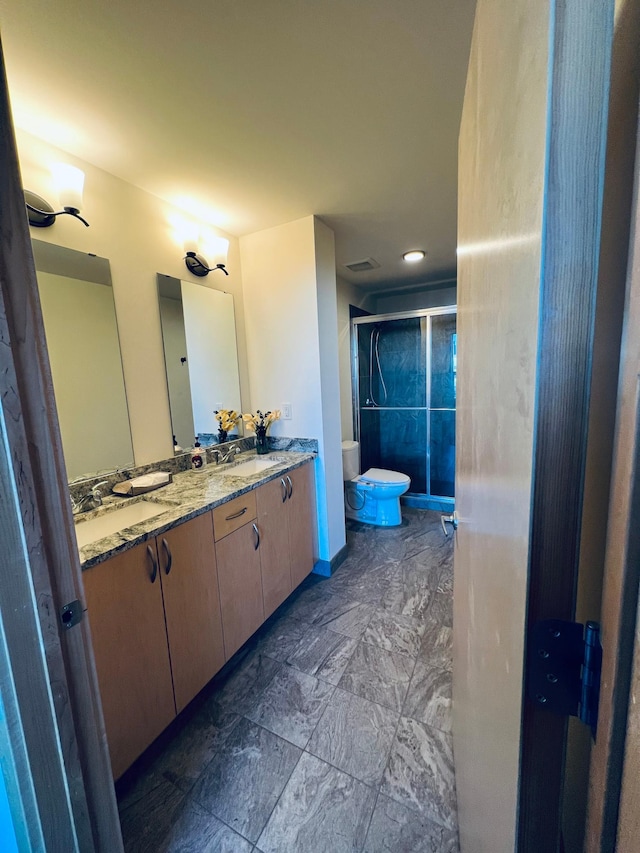 bathroom featuring vanity and walk in shower