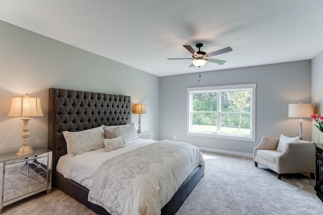 bedroom featuring ceiling fan and carpet flooring