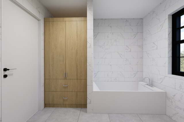 bathroom featuring a washtub, tile walls, and tile patterned flooring