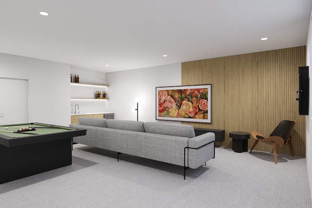 living room with indoor wet bar, light colored carpet, and billiards