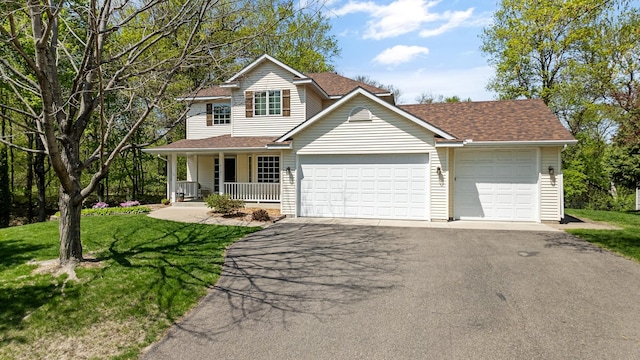4167 Hallgren Ln, Excelsior, MN 55331 - traditional-style home with covered porch, asphalt driveway, a front lawn, an attached garage, and roof with shingles